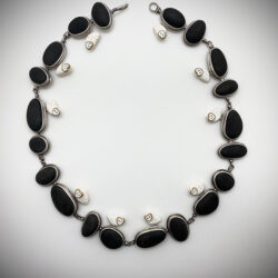black river stone and owl necklace, Carolyn Morris Bach, Art Makers